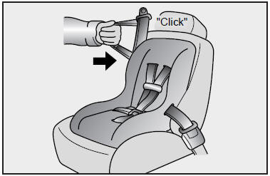 4. Slowly allow the shoulder portion of the safety belt to retract and listen