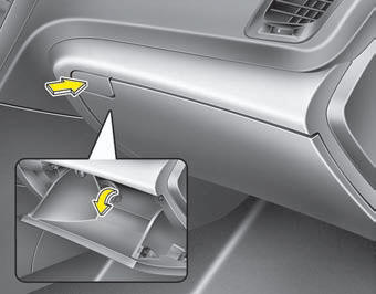 To open the glove box, pull the handle and the glove box will automatically open.